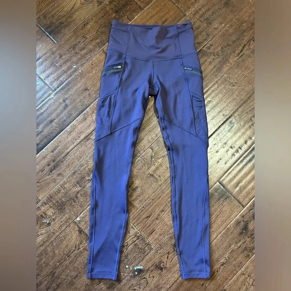 LULULEMON women  purple leggings size 4​